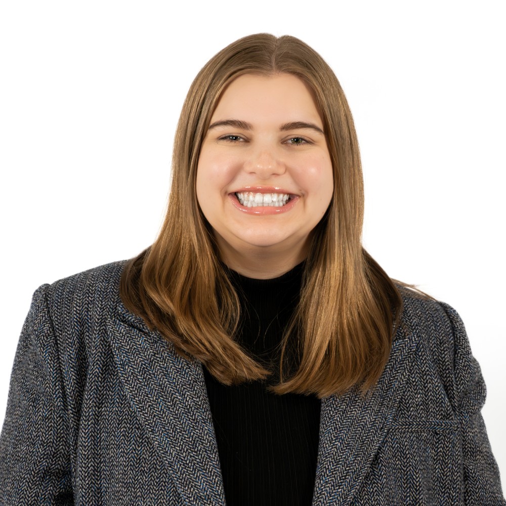 a woman smiling for the camera